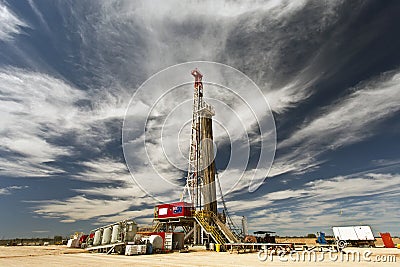 Land Drilling Rig and Cloudy Sky Stock Photo