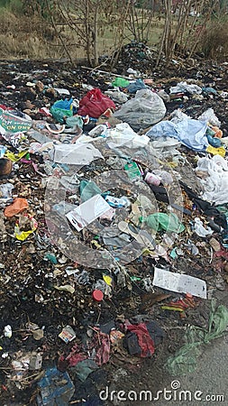 Land pollution garbage on roadside Editorial Stock Photo