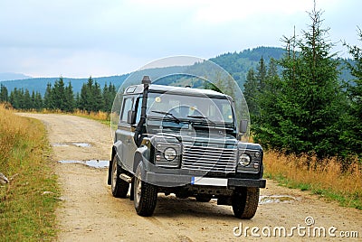 Land Rover, unpaved road Stock Photo