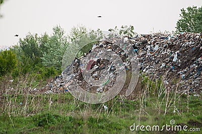 Landfill at the end of the populated place. garbage.Trash Stock Photo