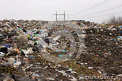 Landfill in Ukraine, piles of plastic dumped in . The roads along inorganic waste jumble Editorial Stock Photo