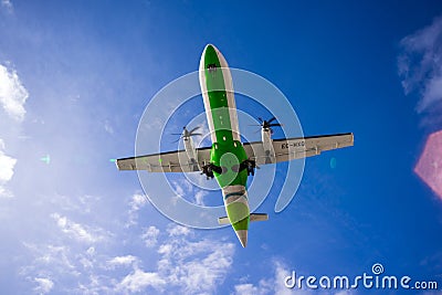 Landing of an ATR 72-600 operated by Binter Canarias at Cesar Manrique-Lanzarote Airport. Lens flare Editorial Stock Photo