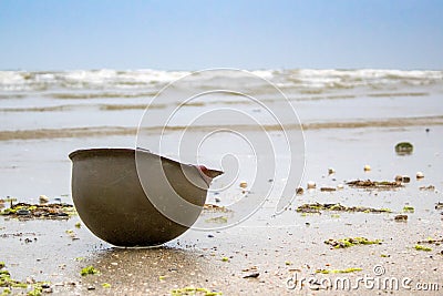 Landing beaches of june 6, 1944 in Normandy. Utah beach. Helmet of a parachutist on the sand. The longest day. Stock Photo