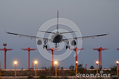 Landing at dusk Stock Photo