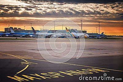 Landing light. Directional sign markings on the tarmac of runway at a commercial airport Stock Photo