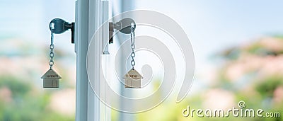 Landlord key for unlocking house is plugged into the door. Second hand house for rent and sale. Owner use hand unlock door Stock Photo