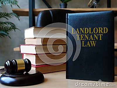 Landlord tenant law book on the lawyer desk Stock Photo