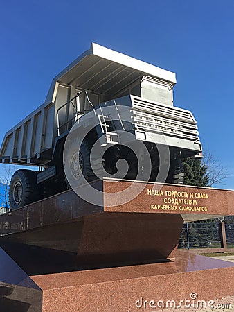 Monument to the Belaz dump truck in the city of Zhodino Editorial Stock Photo