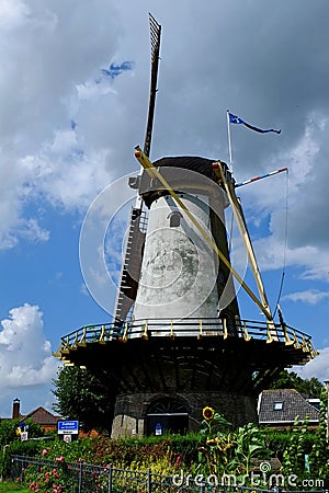 Landmark Dutch windmill at village Editorial Stock Photo