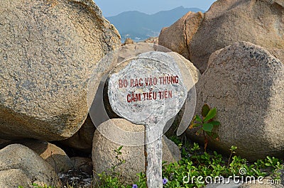 Landmark over rocks on stone island, Vietnam Stock Photo