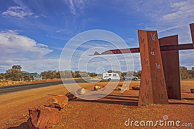 Landmark of Red Centre Way along the road to Yulara and Uluru or Ayers Rock in Northern Territory, Australia. Editorial Stock Photo