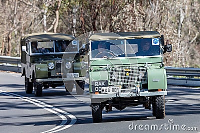 1949 Landrover Series 1 Utility driving on country road Editorial Stock Photo