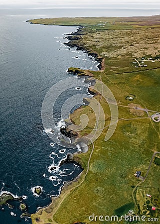 Landscape from above of Gatklettur basalt rock on the Atlantic coast of Arnarstapi. Stock Photo