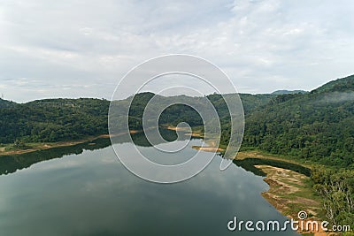 Landscape Aerial view drone shot of mountain around the dam tropical rainforest in thailand Stock Photo