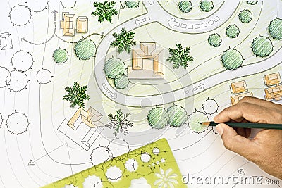 Landscape Architect Designing on site plan Stock Photo