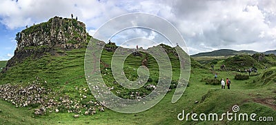 Landscape around Faerie Castle (Castle Ewen) at Fairy Glen in Isle of Skye in Scotland, UK with unrecognizable tourists Stock Photo