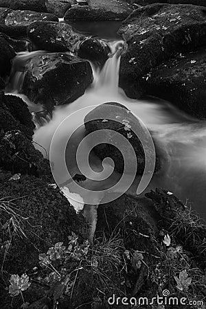 Landscape of Becky Falls waterfall in Dartmoor National Park Eng Stock Photo