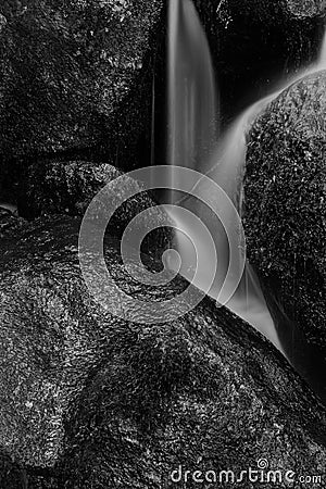 Landscape of Becky Falls waterfall in Dartmoor National Park Eng Stock Photo
