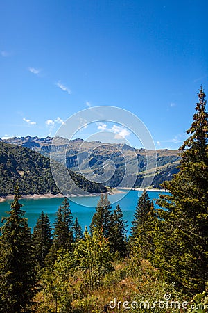 Landscape with blue mountain lake in the Alps. Stock Photo