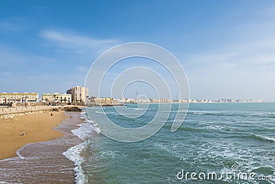 Landscape of Cadiz waterfront and town from the beach. Spain Stock Photo