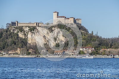 Landscape of the castle of Angera and the city with a boat Stock Photo