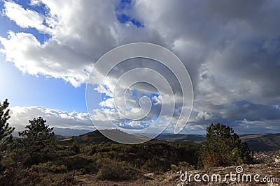 Landscape and cloudy skies in Corbieres, France Stock Photo