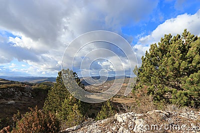 Landscape and cloudy skies in Corbieres, France Stock Photo