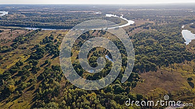 Landscape of the fields, trees and river durig autumn time Stock Photo