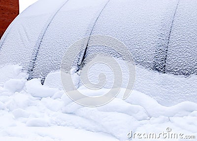 Landscape with a film greenhouse, snow on the greenhouse, winter Stock Photo