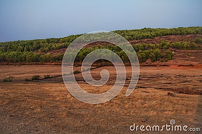 Landscape with flat terrain and hills covered with forests Stock Photo