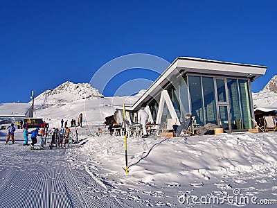 Landscape of a group of skiers gathered on a snowy mountain in St Moritz, Switzerland Editorial Stock Photo