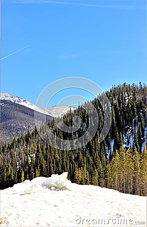 Snow Mountains on a Sunny Day looking at clear blue Colorado Skies Stock Photo