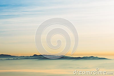 Landscape images of the complex mountains Floated out of the mist in the morning Stock Photo