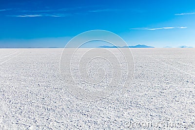 Landscape of incredibly white salt flat Salar de Uyuni, amid the Andes in southwest Bolivia, South America Stock Photo