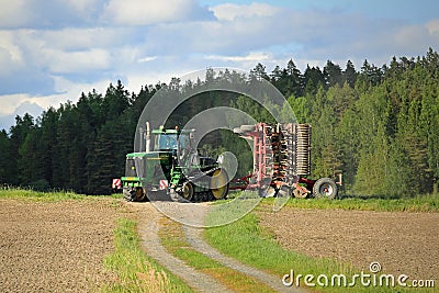 Landscape with John Deere 9520T Crawler Tractor Editorial Stock Photo