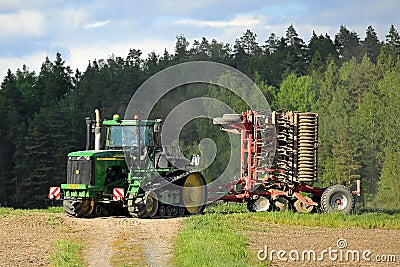 Landscape with John Deere 9520T Crawler Tractor Editorial Stock Photo