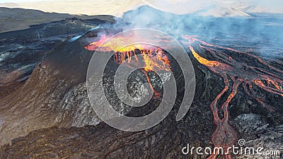 Landscape of lightening erupting from Mauna Loa Volcano in Hawaii with smoke and a hazy sky Stock Photo