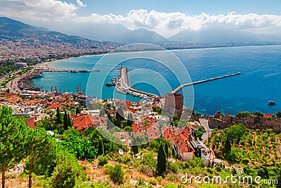 Landscape with marina and Kizil Kule tower in Alanya peninsula, Antalya district, Turkey, Asia. Famous tourist destination with Stock Photo