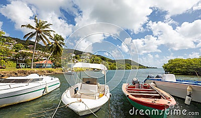 Landscape from Martinique, Caribbean island - Small Fishing Boats at mooring Stock Photo