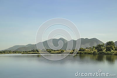 Landscape morning light focus on Traditional boat, Reflex of mountain with water Stock Photo