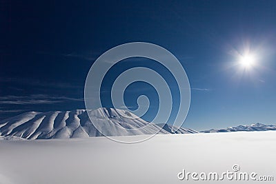 Mount vettore and pian grande with snow Stock Photo