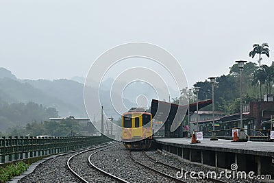 Landscape of mountain and train parking at Dahua train station Editorial Stock Photo