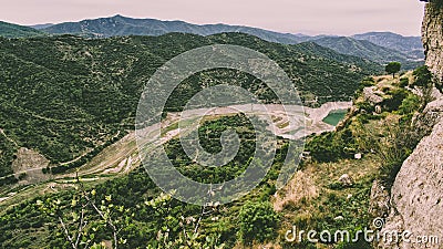 Landscape of mountains with leafy forests. Stock Photo