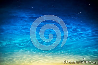 Landscape of night shining noctilucent clouds in the night sky Stock Photo