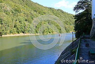 Landscape of Olt Valley with Olt river and Cozia Mountains in Romania Stock Photo