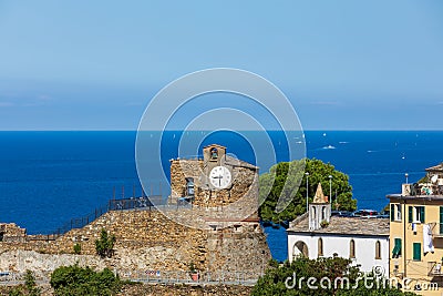 Landscape panorama with castle of Riomaggiore, historic building located in the upper part of Editorial Stock Photo