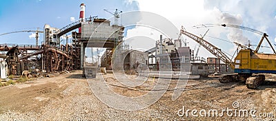 Landscape, panorama, view of factory slums with metal hulls and machines for the production of the coking industry, Editorial Stock Photo