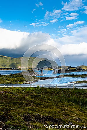 Landscape panoramic view to Fredvang bridge, Torvoya and buoya islands and Hovdanvika bay at Lofoten, Norway Stock Photo