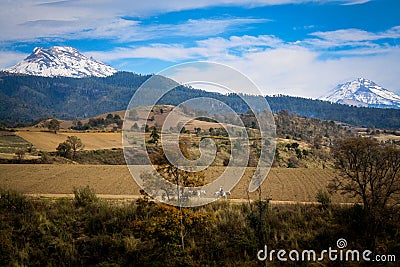 Landscape photo of popocatepetl and iztaccihuatl volcanoes in ce Stock Photo