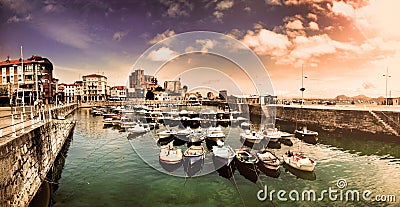 Landscape of pier in fishing village. Coastal tourism of Spain. Castro urdiales.Cantabria Stock Photo